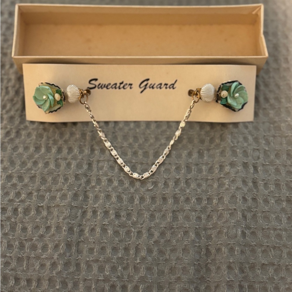 Elegant Gold and blue Sweater Guard